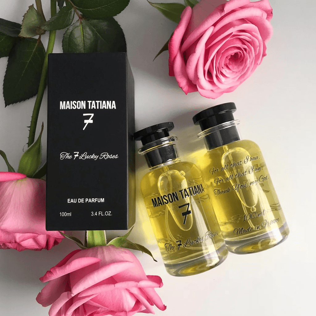 Luxury perfume with pink roses