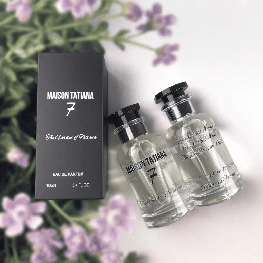 The Garden of Tatiana perfume with a floral background